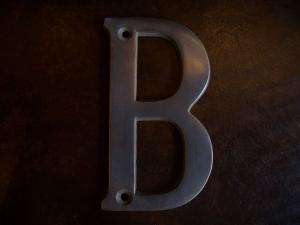 Brass Sign B