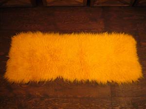 yellow shaggy rug