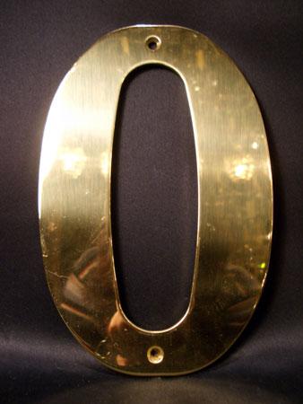 brass sign “0”