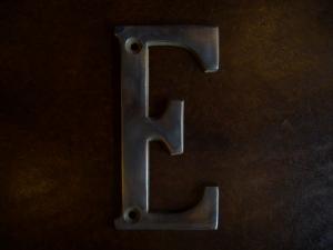 Brass Sign E