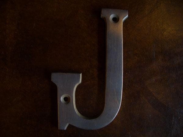 Brass Sign J