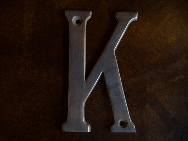 Brass Sign K