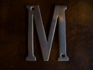 Brass Sign M