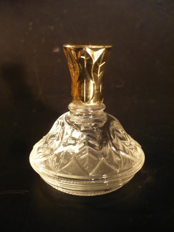 French glass filled perfume bottle