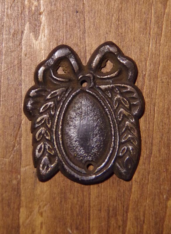 Brass wall ornament