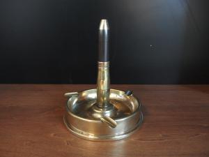 Brass ashtray with cigarette lighter