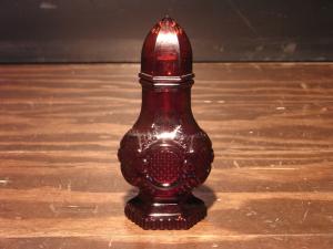 Avon red glass bottle
