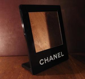 black CHANEL stand mirror