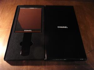 black CHANEL hand mirror