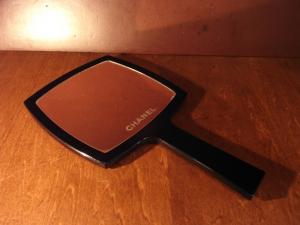 black CHANEL hand mirror