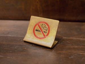 brass no smoking sign stand