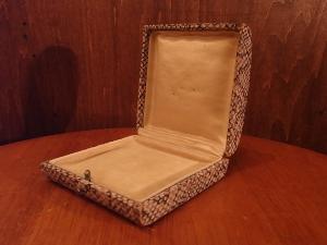 English python velvet jewelry display case