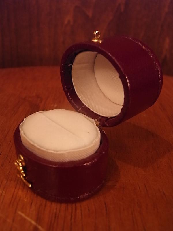 Italian red oval ring display case