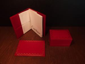 red Cartier watch display case