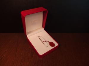 red Cartier watch display case