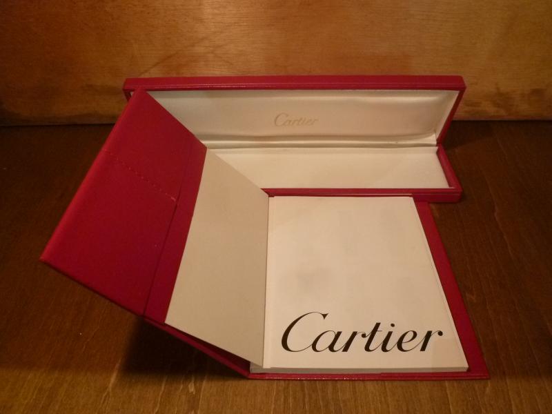 red Cartier watch display case