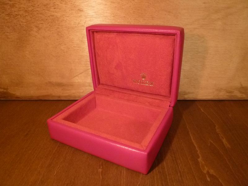 red ROLEX watch display case