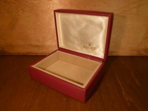 red ROLEX watch display case