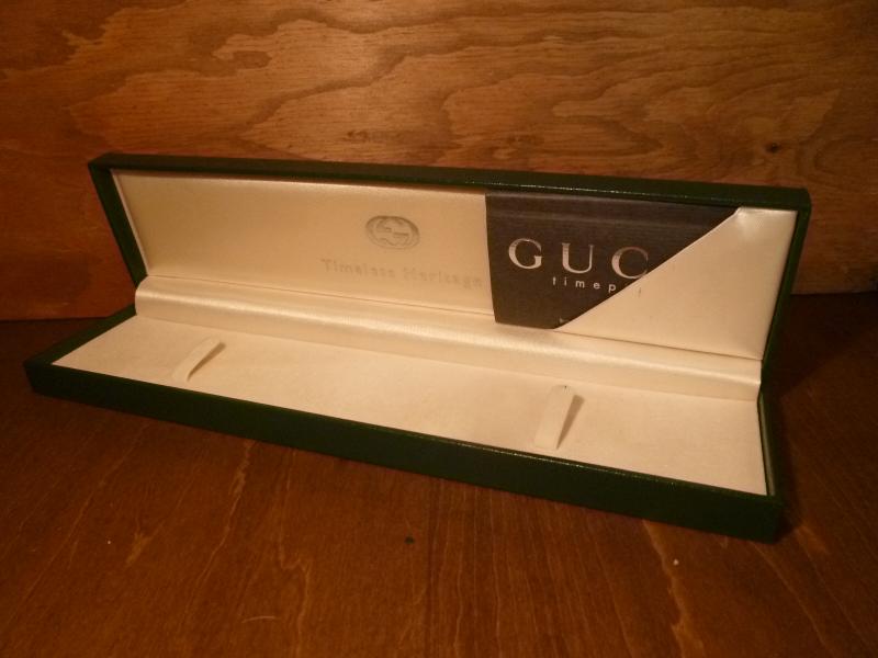 green GUCCI watch display case