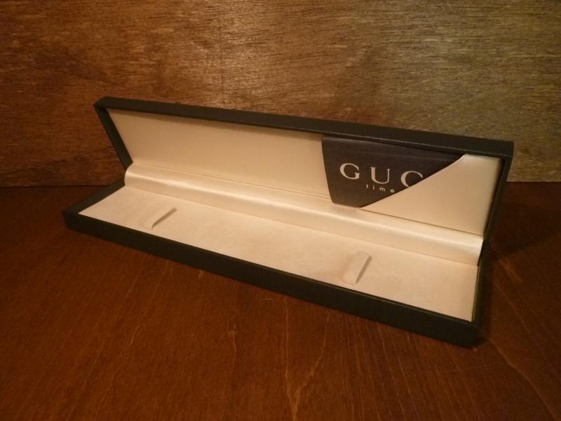 green GUCCI watch display case