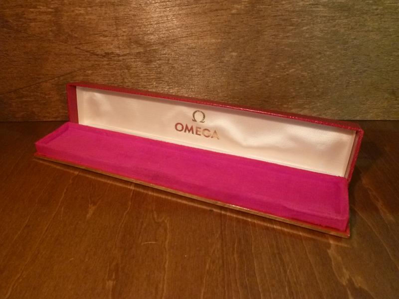 red OMEGA watch display case