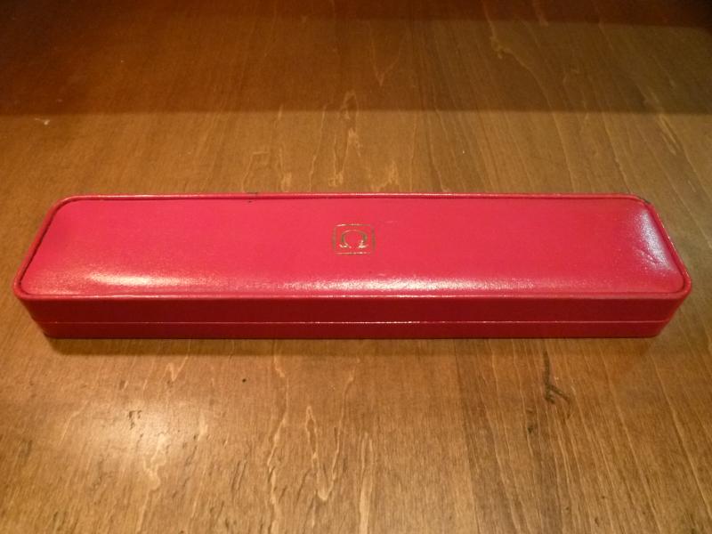 red OMEGA watch display case