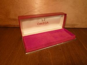 red OMEGA watch display case