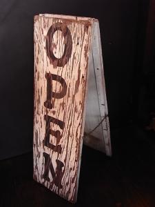 white OPEN sign board stand