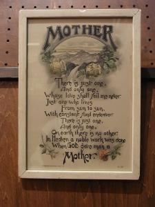 white ”MOTHER” motto