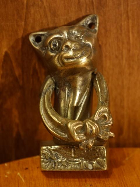 Italian brass cat & ribbon door knocker