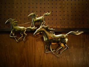 Bijan brass horses wall ornament
