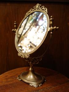 Italian brass oval stand mirror