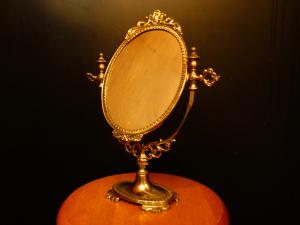 Italian brass oval stand mirror