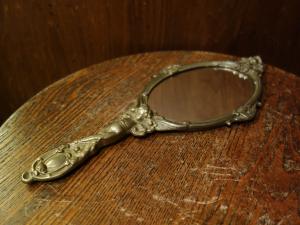 Italian brass hand mirror