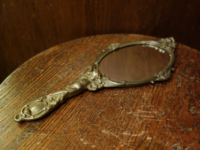 Italian brass hand mirror