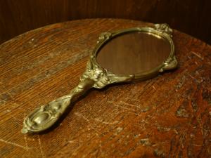 Italian brass hand mirror