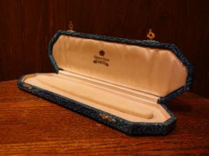 English green necklace display case