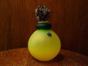 Italian yellow glass bottle