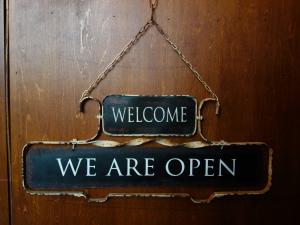 white OPEN/CLOSE sign wall ornament