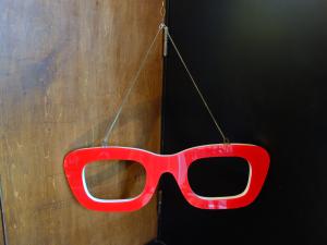 red & blue glasses display sign