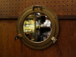 Italian brass marine wall mirror
