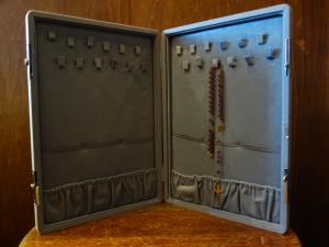 gray necklace case