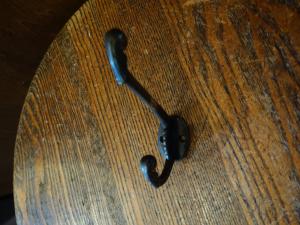 black hat coat hook