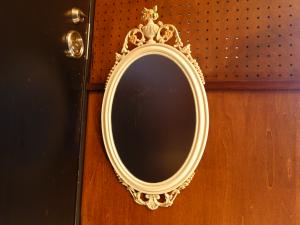 Italian white oval wall mirror