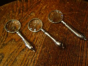 silver magnifying glass