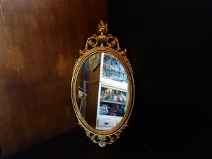 Italian gold oval wall mirror