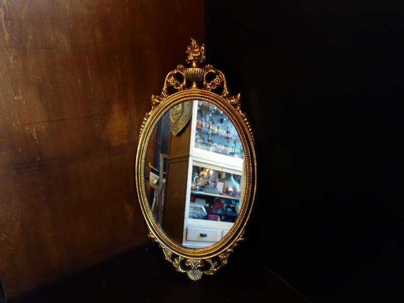 Italian gold oval wall mirror